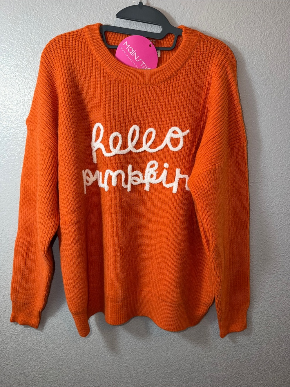 Main Strip Orange Knit Sweater with White Script